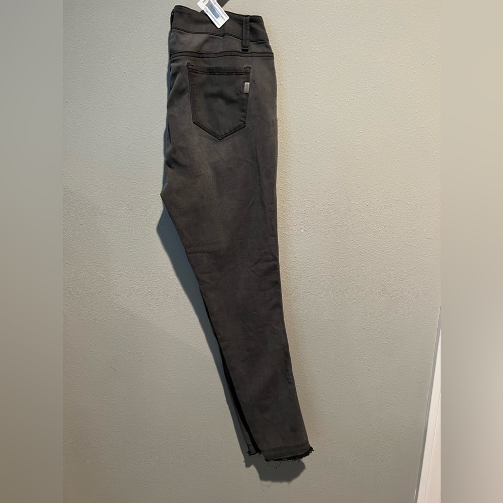 Women’s mid rise skinny with frayed hem jeans